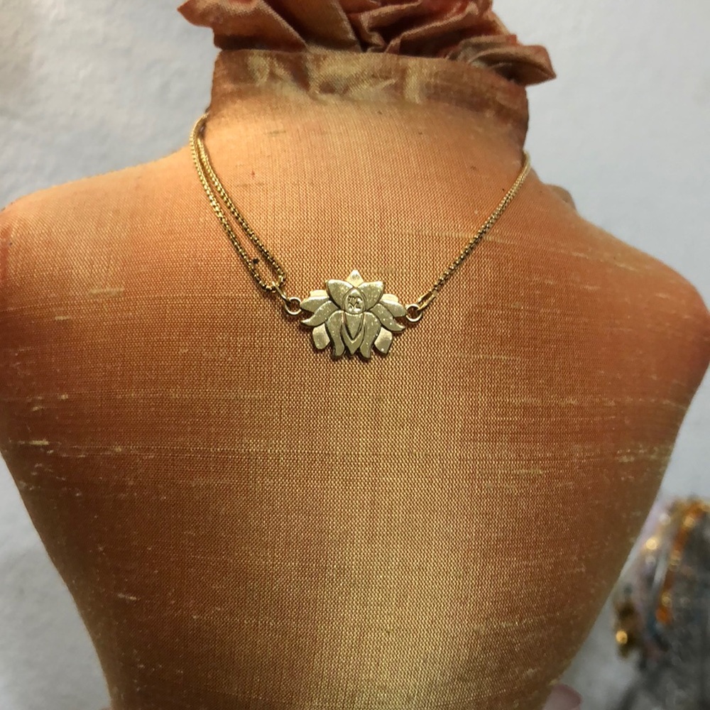 Alex and Ani Lotus pull chain bracelet in gold
